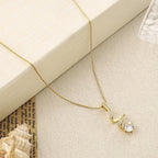 Elegant S-Shape Crystal Pendant Necklace – Gold Finish